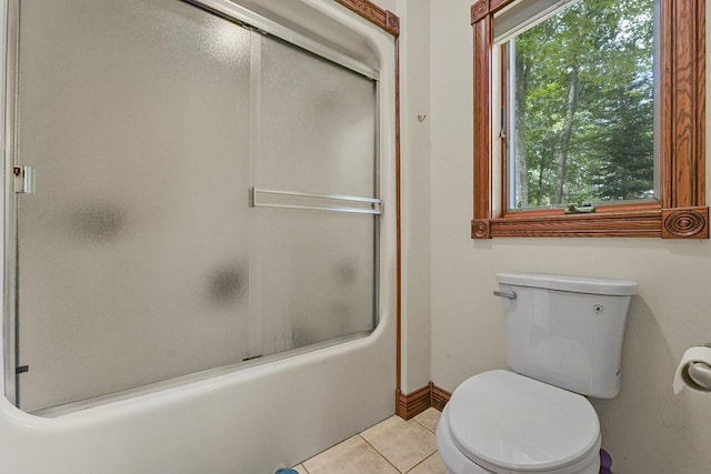 142 Frisco Dr, Houghton Lake, MI 48629 - bathroom with plenty of natural light, tile patterned floors, and bath / shower combo with glass door