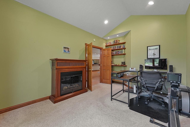 142 Frisco Dr, Houghton Lake, MI 48629 - office area featuring carpet floors, high vaulted ceiling, a glass covered fireplace, and recessed lighting
