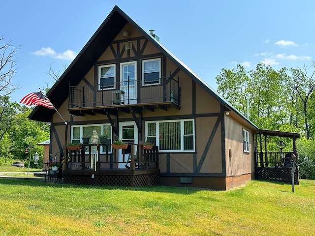 2585 M-33, Comins, MI 48619 - rear view of property with a balcony, a yard, a wooden deck, and crawl space