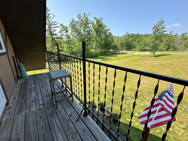 2585 M-33, Comins, MI 48619 - balcony with a wooded view