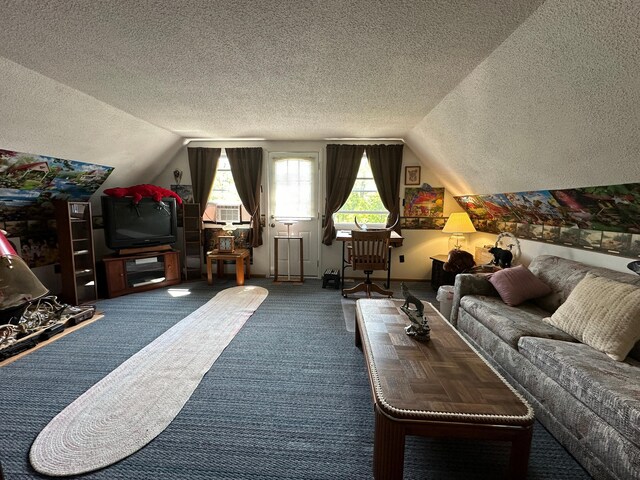 2585 M-33, Comins, MI 48619 - living area featuring vaulted ceiling, a textured ceiling, carpet flooring, and cooling unit