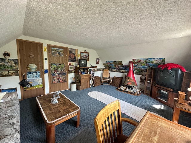 2585 M-33, Comins, MI 48619 - carpeted living area with lofted ceiling and a textured ceiling