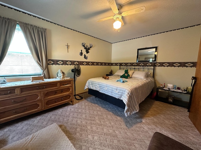 2585 M-33, Comins, MI 48619 - carpeted bedroom with a ceiling fan