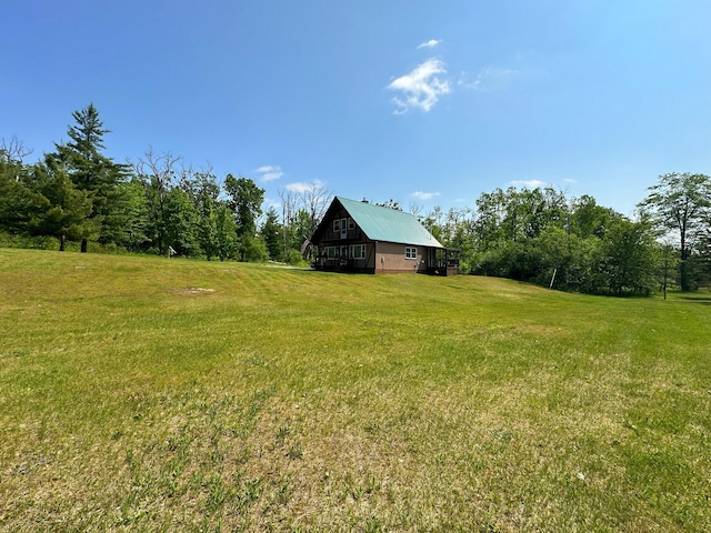 2585 M-33, Comins, MI 48619 - view of green lawn