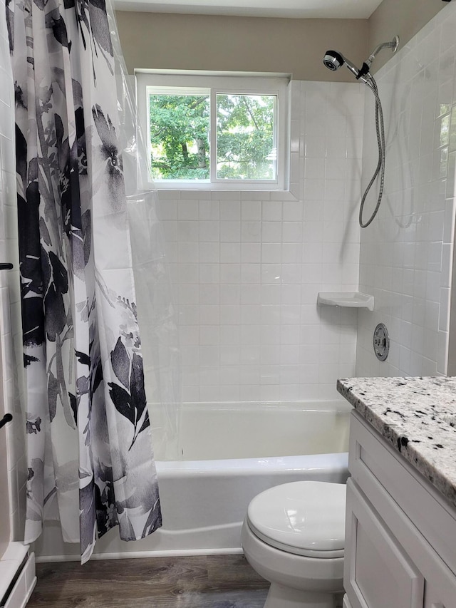 1251 Kingston Ave, Flint, MI 48507 - bathroom with vanity, wood finished floors, and shower / tub combo