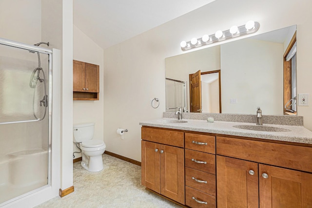 6296 Wolverine Trl, Gaylord, MI 49735 - bathroom featuring double vanity, a stall shower, and lofted ceiling