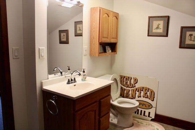 3009 NE Trl, Grayling, MI 49738 - bathroom featuring lofted ceiling and vanity