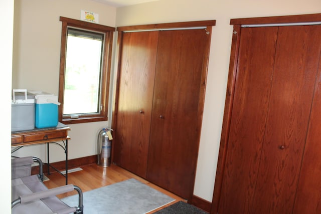 3009 NE Trl, Grayling, MI 49738 - home office featuring healthy amount of natural light and wood finished floors