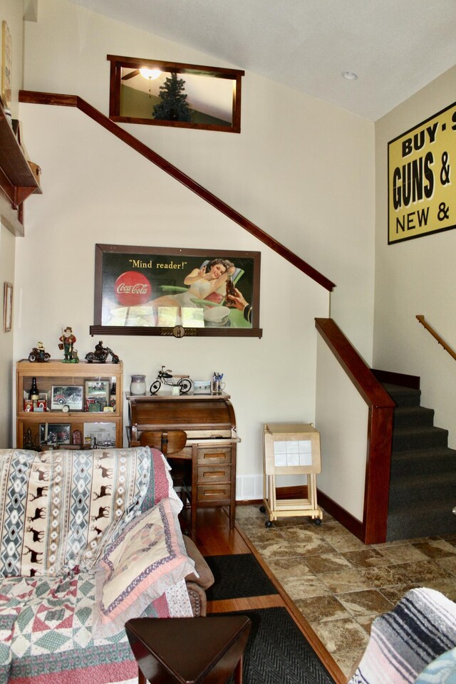 3009 NE Trl, Grayling, MI 49738 - living room featuring stairway