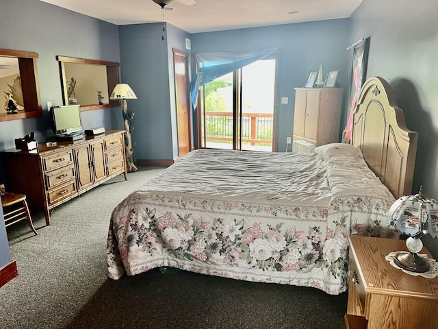 3009 NE Trl, Grayling, MI 49738 - bedroom with light carpet and access to outside