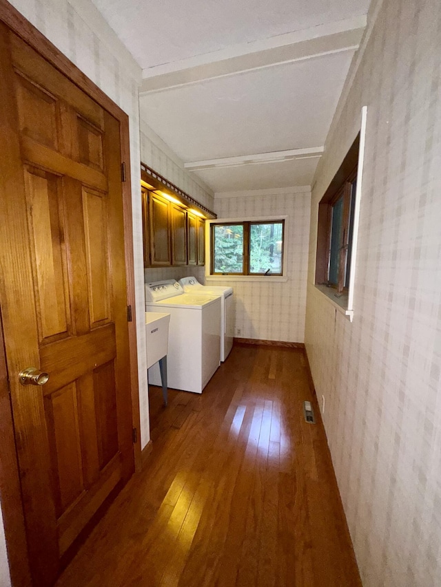 5200 Pine Grove Dr, Spruce, MI 48762 - washroom with cabinet space, hardwood / wood-style flooring, wallpapered walls, and washer and dryer