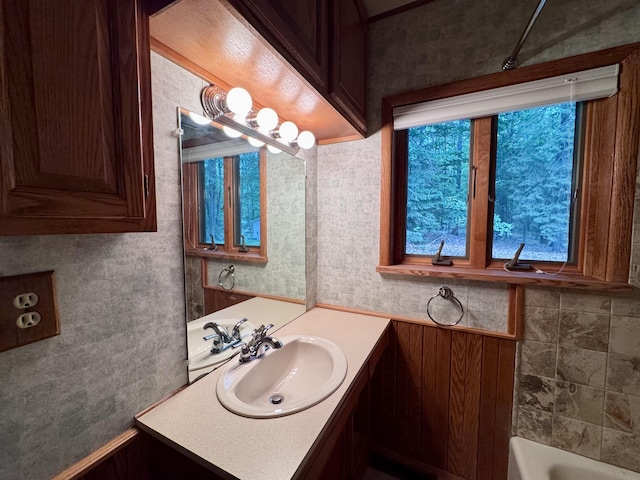 5200 Pine Grove Dr, Spruce, MI 48762 - bathroom with vanity and a tub
