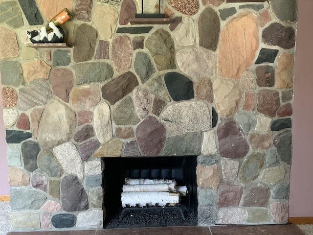 185 S June St, Alpena, MI 49707 - detailed view of a multi sided fireplace