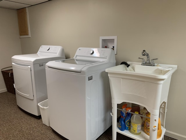 185 S June St, Alpena, MI 49707 - laundry room featuring washing machine and clothes dryer and carpet floors