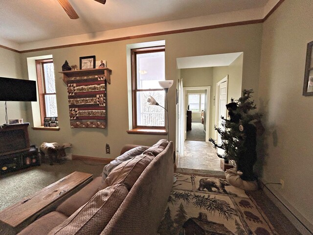 380 Church St, Saint Ignace, MI 49781 - living room featuring a ceiling fan and carpet floors