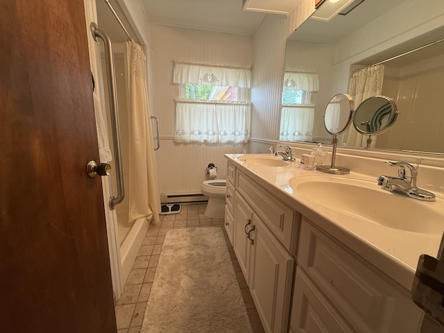 5913 M-33, Cheboygan, MI 49721 - full bath with curtained shower, baseboard heating, tile patterned floors, and double vanity