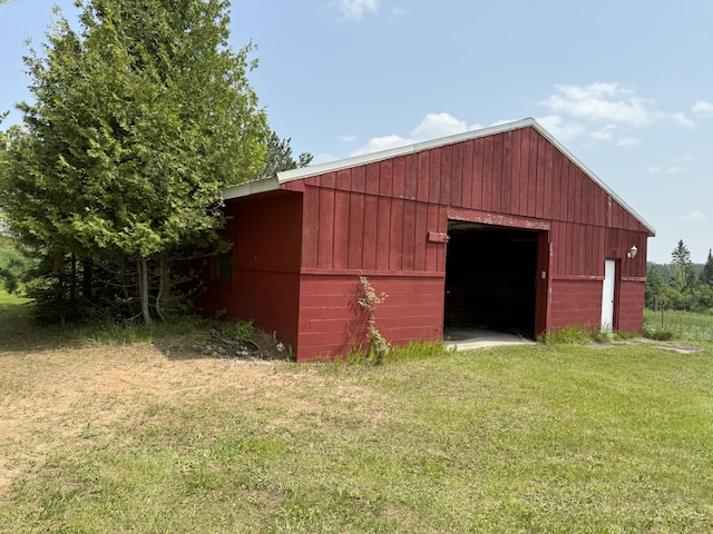 5913 M-33, Cheboygan, MI 49721 - view of pole building featuring a lawn