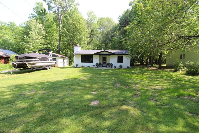211 Daytona Rd, Roscommon, MI 48653 - view of green lawn