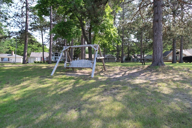 211 Daytona Rd, Roscommon, MI 48653 - view of grassy yard with a residential view