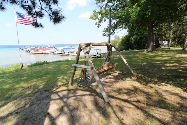 211 Daytona Rd, Roscommon, MI 48653 - view of home's community with a water view and a lawn