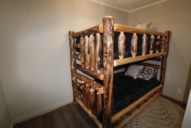 211 Daytona Rd, Roscommon, MI 48653 - bedroom with wood finished floors and ornamental molding