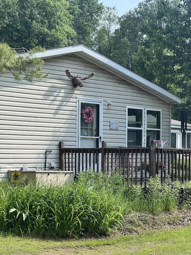577 Wilderness Trl, Saint Helen, MI 48656 - view of front of property with a deck