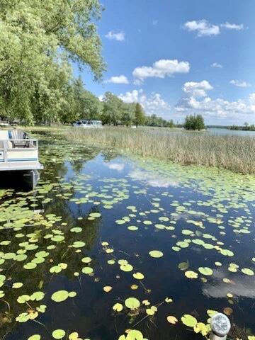 14781 Shubert Hwy, Posen, MI 49776 - dock featuring a water view