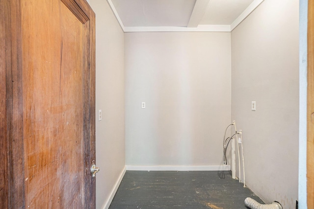 1014 Court St, Cheboygan, MI 49721 - laundry area with crown molding and baseboards