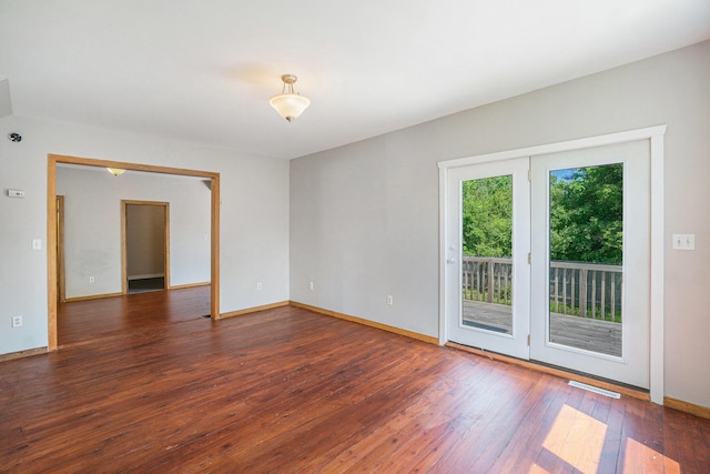 1014 Court St, Cheboygan, MI 49721 - unfurnished room featuring hardwood / wood-style floors and baseboards