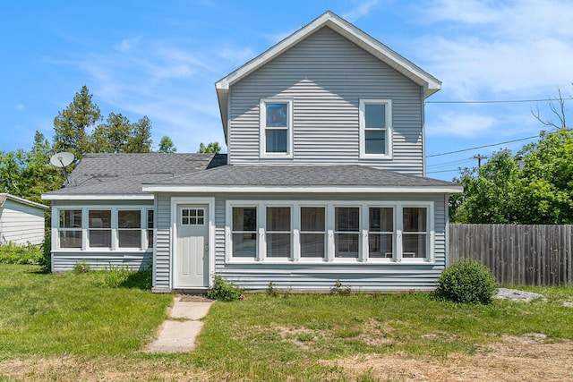 1014 Court St, Cheboygan, MI 49721 - view of front of home featuring a shingled roof