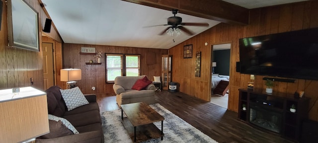 3211 S Partridge Point Rd, Alpena, MI 49707 - living area with wooden walls, ceiling fan, and wood finished floors