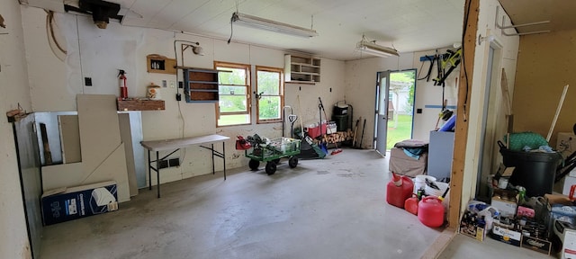 3211 S Partridge Point Rd, Alpena, MI 49707 - garage featuring a porch