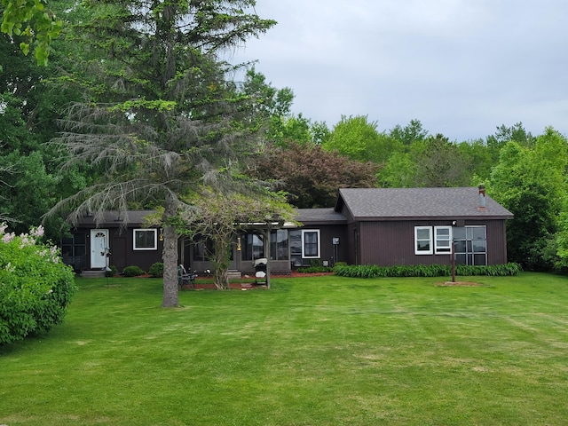 3211 S Partridge Point Rd, Alpena, MI 49707 - view of front of property with a front yard