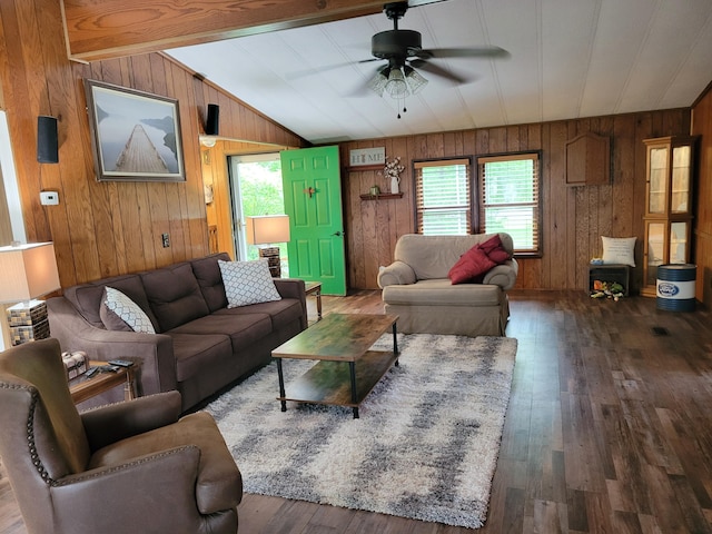 3211 S Partridge Point Rd, Alpena, MI 49707 - living area with healthy amount of natural light, ceiling fan, wooden walls, and wood finished floors