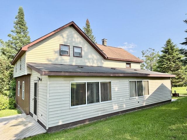 7770 Klein Rd, Hillman, MI 49746 - back of property featuring a lawn
