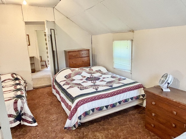 7770 Klein Rd, Hillman, MI 49746 - bedroom featuring carpet floors and lofted ceiling