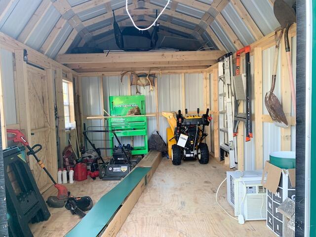 9319 Blue Horizon Rd, Presque Isle, MI 49777 - storage with a garage