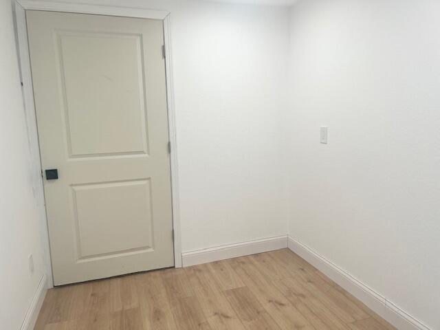 9319 Blue Horizon Rd, Presque Isle, MI 49777 - unfurnished room with light wood-style floors and baseboards