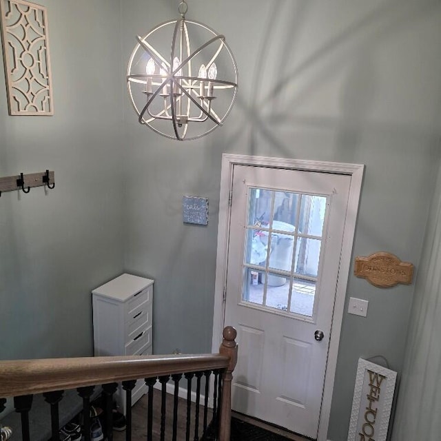 510 W Baldwin St, Alpena, MI 49707 - entryway featuring a chandelier
