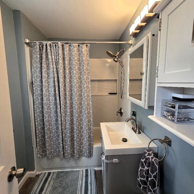 510 W Baldwin St, Alpena, MI 49707 - full bathroom with vanity and shower / bath combo with shower curtain