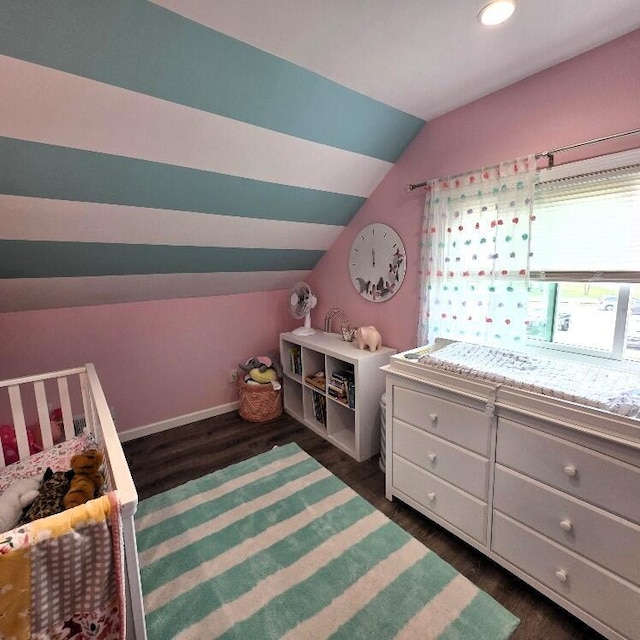 510 W Baldwin St, Alpena, MI 49707 - bedroom with vaulted ceiling, dark wood finished floors, and recessed lighting