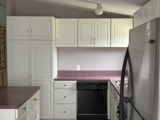 348 Lake Winyah Rd, Alpena, MI 49707 - kitchen with freestanding refrigerator, black dishwasher, dark countertops, a textured ceiling, and white cabinetry