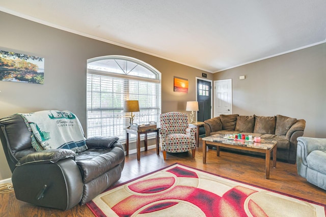 5514 N Bay Ct, Presque Isle, MI 49777 - living area featuring wood finished floors and ornamental molding