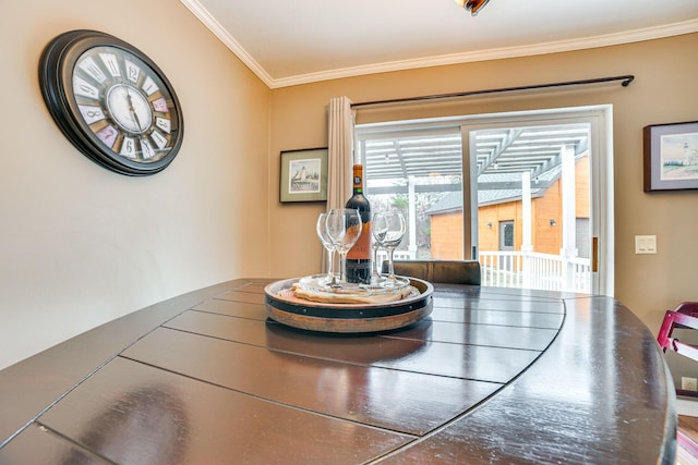 5514 N Bay Ct, Presque Isle, MI 49777 - dining space featuring ornamental molding