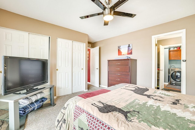5514 N Bay Ct, Presque Isle, MI 49777 - bedroom with washer / dryer, carpet, two closets, and ceiling fan