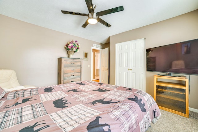 5514 N Bay Ct, Presque Isle, MI 49777 - carpeted bedroom with a closet and a ceiling fan
