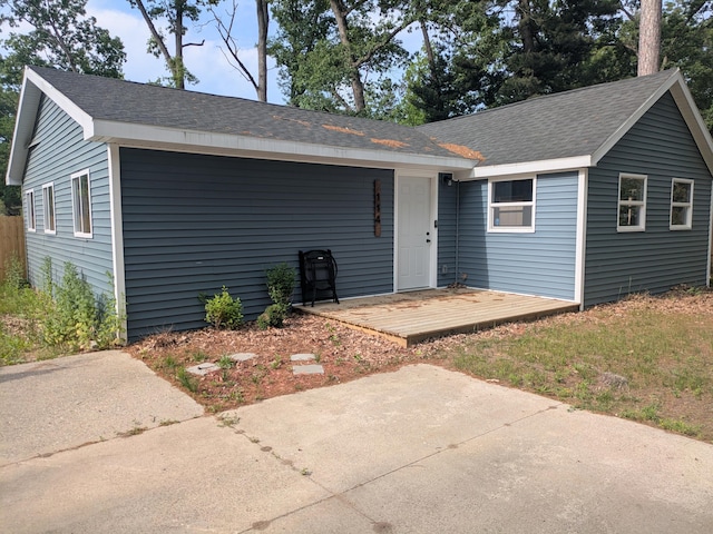 114 Pine St, Prudenville, MI 48651 - ranch-style house with a shingled roof
