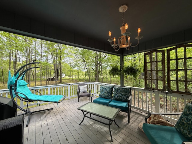 108 Bourbon St, Roscommon, MI 48653 - sunroom / solarium featuring a chandelier