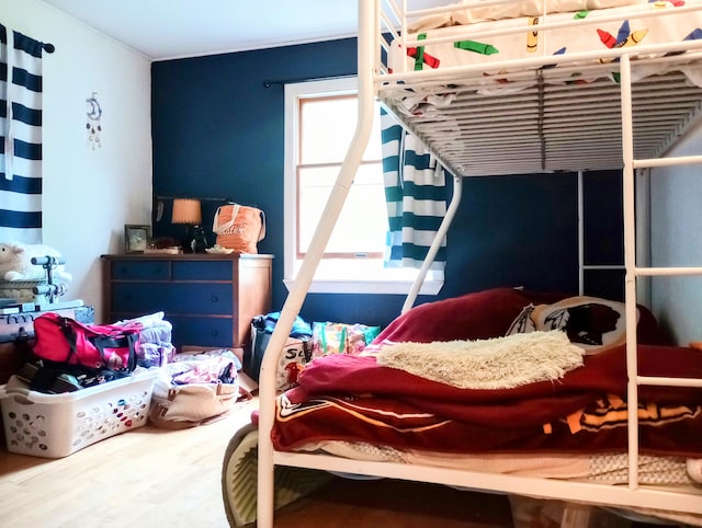 223 Mallard Ave, Houghton Lake, MI 48629 - bedroom with wood finished floors
