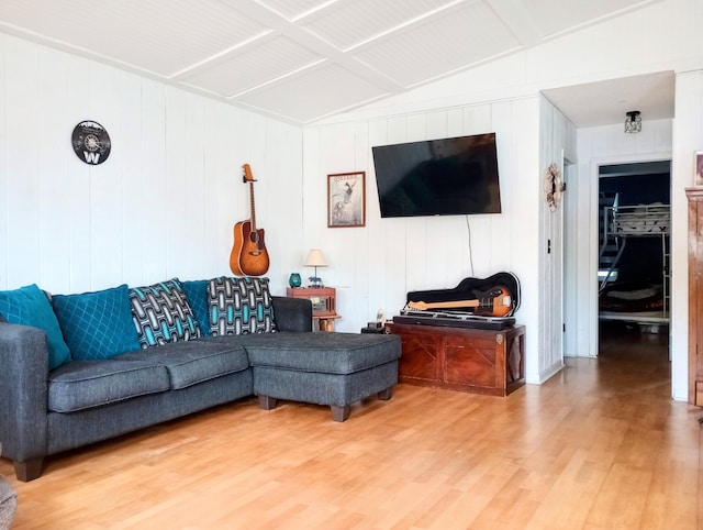 223 Mallard Ave, Houghton Lake, MI 48629 - living room with wood finished floors and lofted ceiling